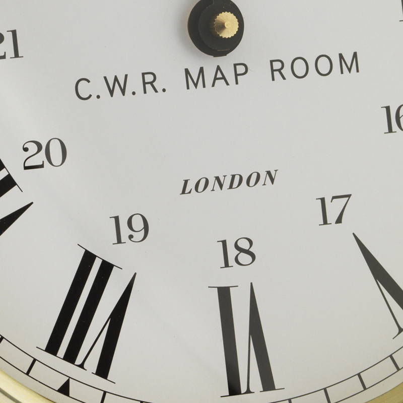 CWR map room clock face with black roman numerals and big and small hands
